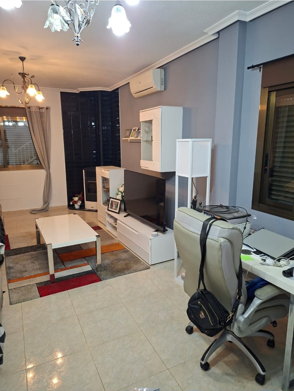 Finished lounge with freshly painted grey interior walls and white ceiling