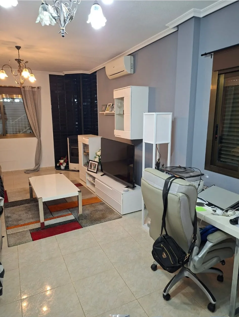 Finished lounge with freshly painted grey interior walls and white ceiling