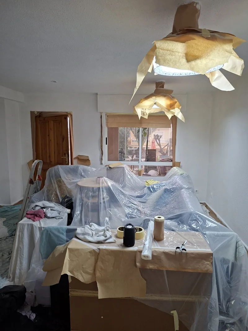 Protected living room ready for painting