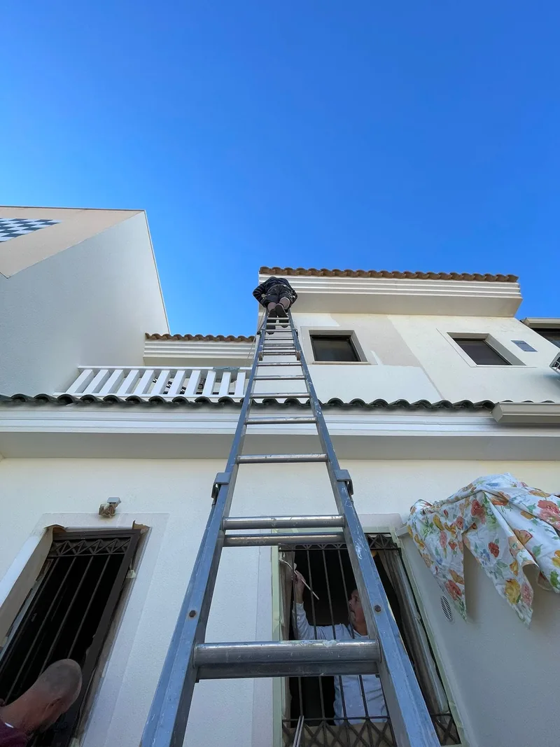 Crisp white exterior paintwork on a Costa Blanca villa